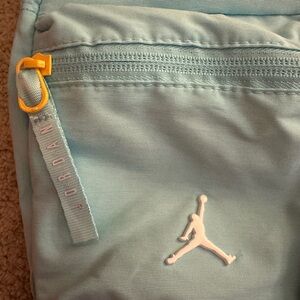 New Jordan Blue Crossbody Bag Sleek Design with yellow trim Crossbody